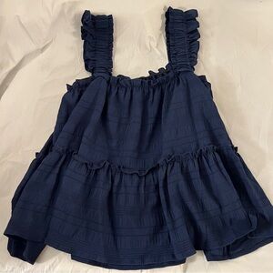 3/10.00….Navy Ruffled Sleeveless Top